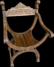 Fauteuil dit Dagobert en bois sculpté vers 1900