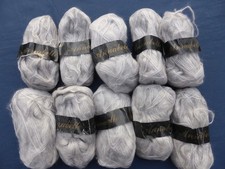 12 pelotes 50 g Laine