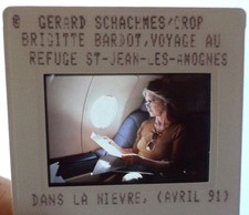 Diapositive d'agence (Slide) Brigitte BARDOT dans un avion privé 1991 DIAPO