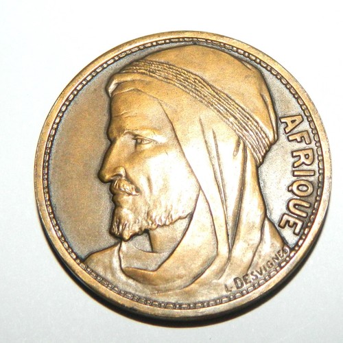 Jolie médaille afrique - jolie,