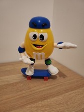 Distributeur M&M'S Jaune, Skateboard 