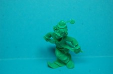 FIGURINE MONOCHROME DUNKIN ROCHE AUX FEES CLOWN AVEC FLEUR VERT