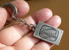 Ancien porte clé métal SONECLAIR Radio Télévision, Années 60.