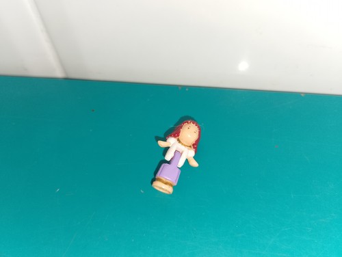 Polly pocket figurine doll