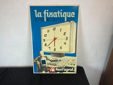 Ancienne plaque publicitaire en Plexiglas horloge, LA FIXATIQUE rest agraf