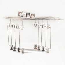 Four 4x5" film hangers, tank