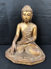 Bouddha en bois sculpté -