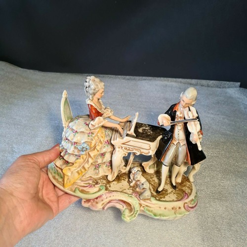 Statuette porcelaine - 🔅,