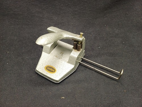 Ancien perforateur métal