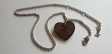 Yves Saint Laurent 925 sterling silver and wood heart necklace. Rare.