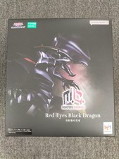 Figurine dragon noir aux yeux