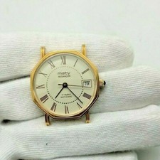 Montre MATY Besançon date  Mouvement mécanique années 50-60 plaqué or 