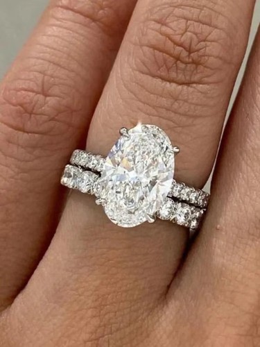 Bague mariage sertie de - de,