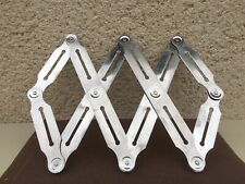 Ancien dessous de plat en inox