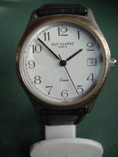 1 Montre Homme-GUY de CLARAC- à quartz boitier chromé des années 1990-2000