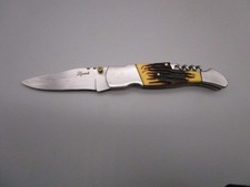 Couteau/tire bouchon pliant