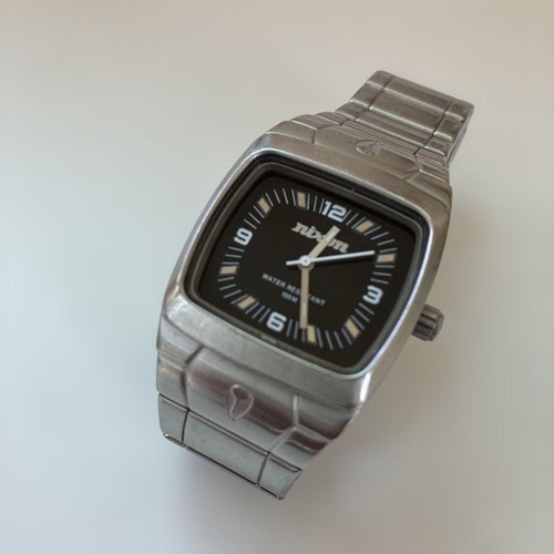 Repeated nixon watch - repeated,