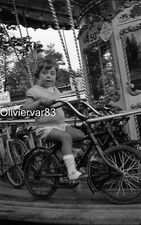 Négatif photo vintage - feillette sur un manège forain Vélosport
