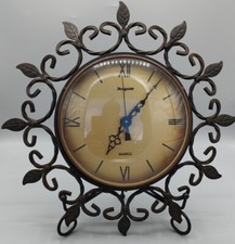 ?Horloge murale Hangarter, quartz, en fer forgé