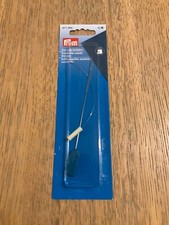 enfile-aiguille machine à