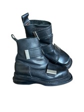 Bottes plateforme bondage cuir