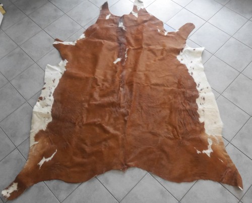 Beau tapis peau - peau, vache