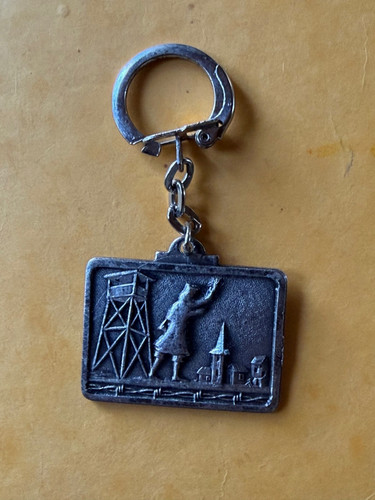 Porte clés retour de - -,