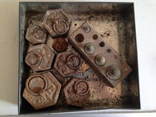 ancienne série de 11  poids en fonte, pour balance ou autres 