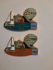 lot de 2 pin's salon st amand-montrond 2025 (voilier,ca,radio,coccinelle)