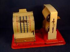 Ancien jouet tôle miniature caisse enregistreuse dévidoir rouleau épicerie 