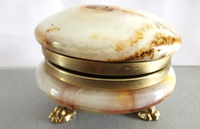 Boite à bijoux en onyx ronde sur pieds