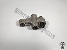 Basculeur d'amortisseur