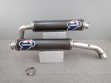 Sans bande de silencieux