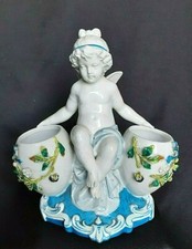 Sujet figurine chérubin bouquetière porcelaine angelot signature à identifier
