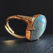 Bague marquise turquoise sertie en 4 griffes monture plaqué or taille ajustable