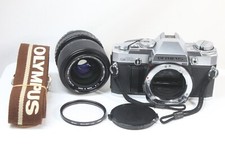 Appareil photo reflex argentique 35 mm Olympus OM30 + objectif OM System S Zu...