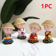 1PC Secouer Tête Moines