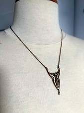 Pendentif en métal doré