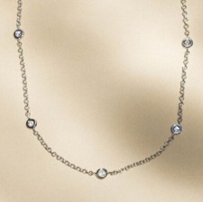 Collier or blanc et diamants