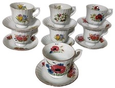 7 Tasses En Porcelaine Modèle Les 4 Saisons ( 6 à café 1 à thé)