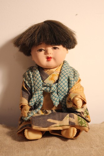 Ancienne petite poupée