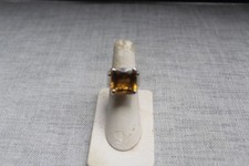 BAGUE ARGENT ORNEE D'UNE CITRINE "COGNAC". ENVIRON 6 CARATS.  TdeD  55