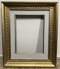 Cadre ancien doré à décors