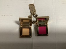 Breloque maquillage ysl en
