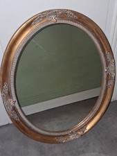Miroir ovale mural doré style