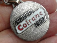 Ancien porte cle métal Augis