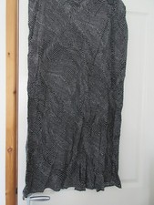 Jupe longue noire tachetée