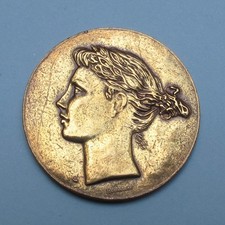 Médaille en cuivre doré de