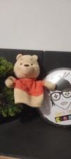 doudou petite marionnette Winnie l'ourson pooh jaune orange marron disney kidsil