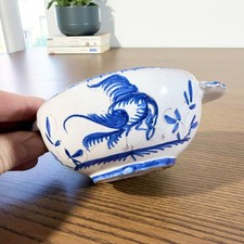 Écuelle ancienne en faïence